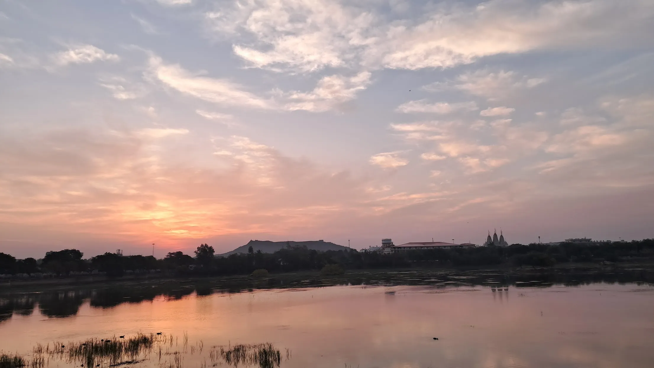 Sunset skyline of Bhuj with temple spires nearby